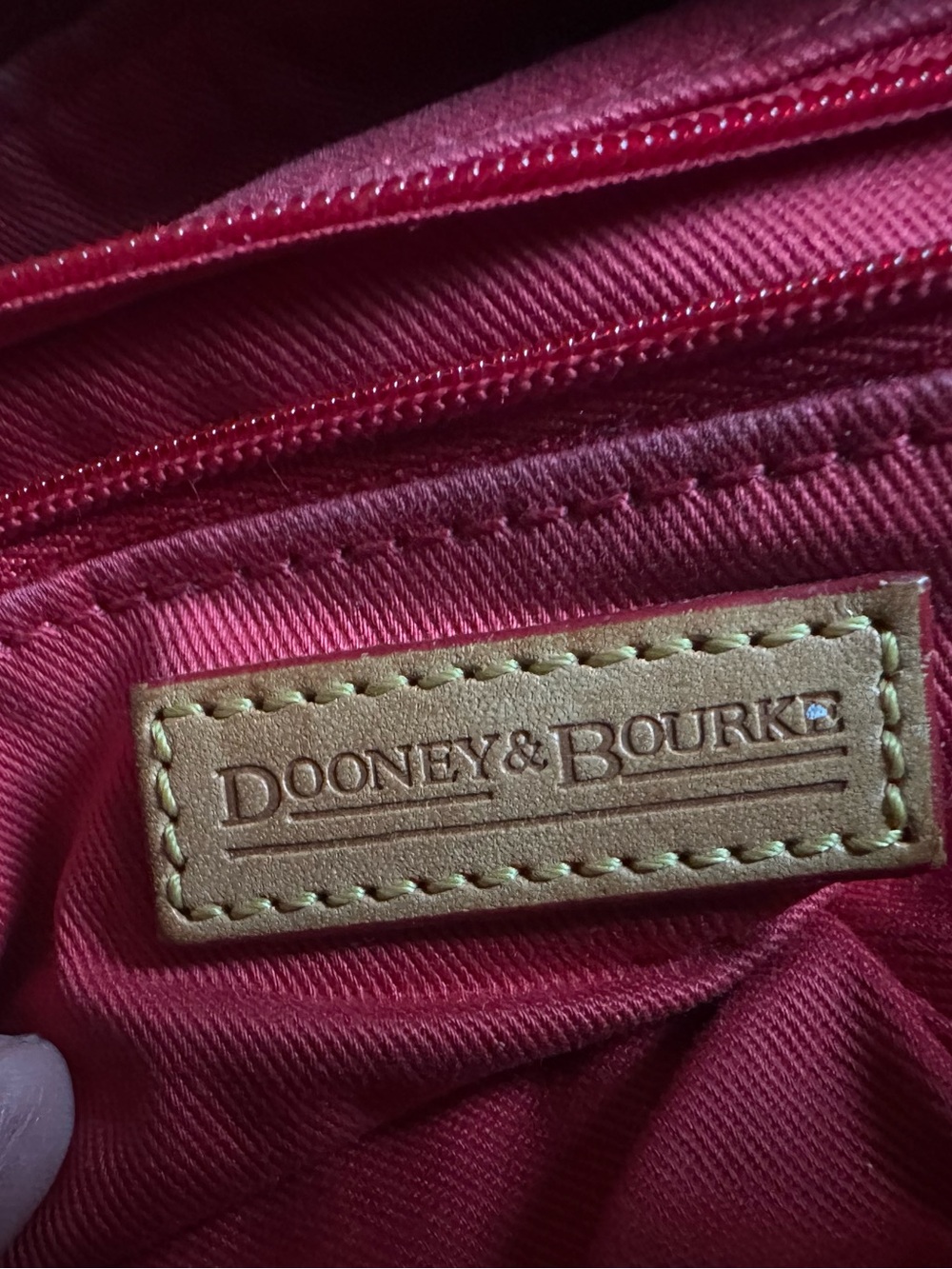 Dooney & Bourke Red Lined Handbag Interior with Tan Leather Label